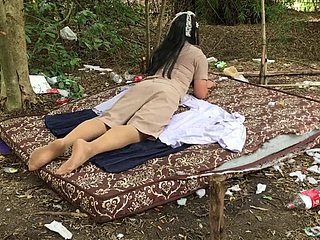Thai ladyboy teacher alone open-air